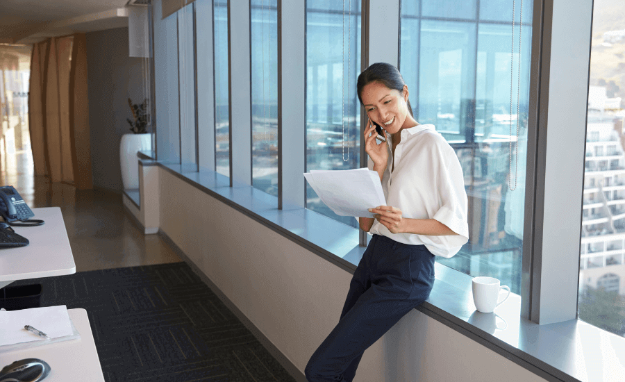 woman standing on the phone